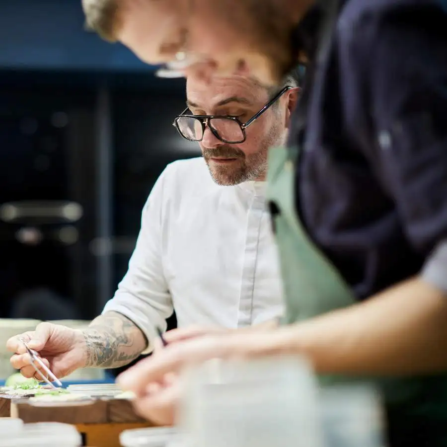 Chef Hans Neuner dish prep.